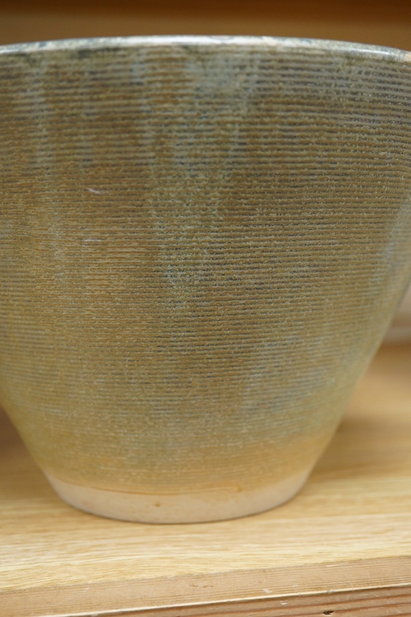 A Studio pottery ribbed conical bowl, impressed mark, 16cm high